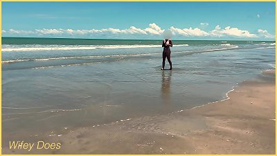 wife toying nude football public clothed beach