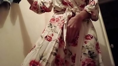 Our housekeeper doesn't know that we are looking on her as she jerks in the kitchen