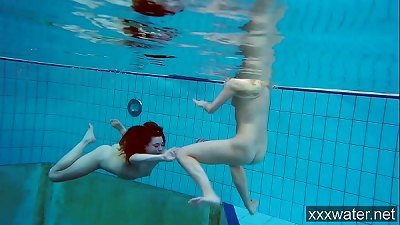 torrid Russian dolls swimming in the pool